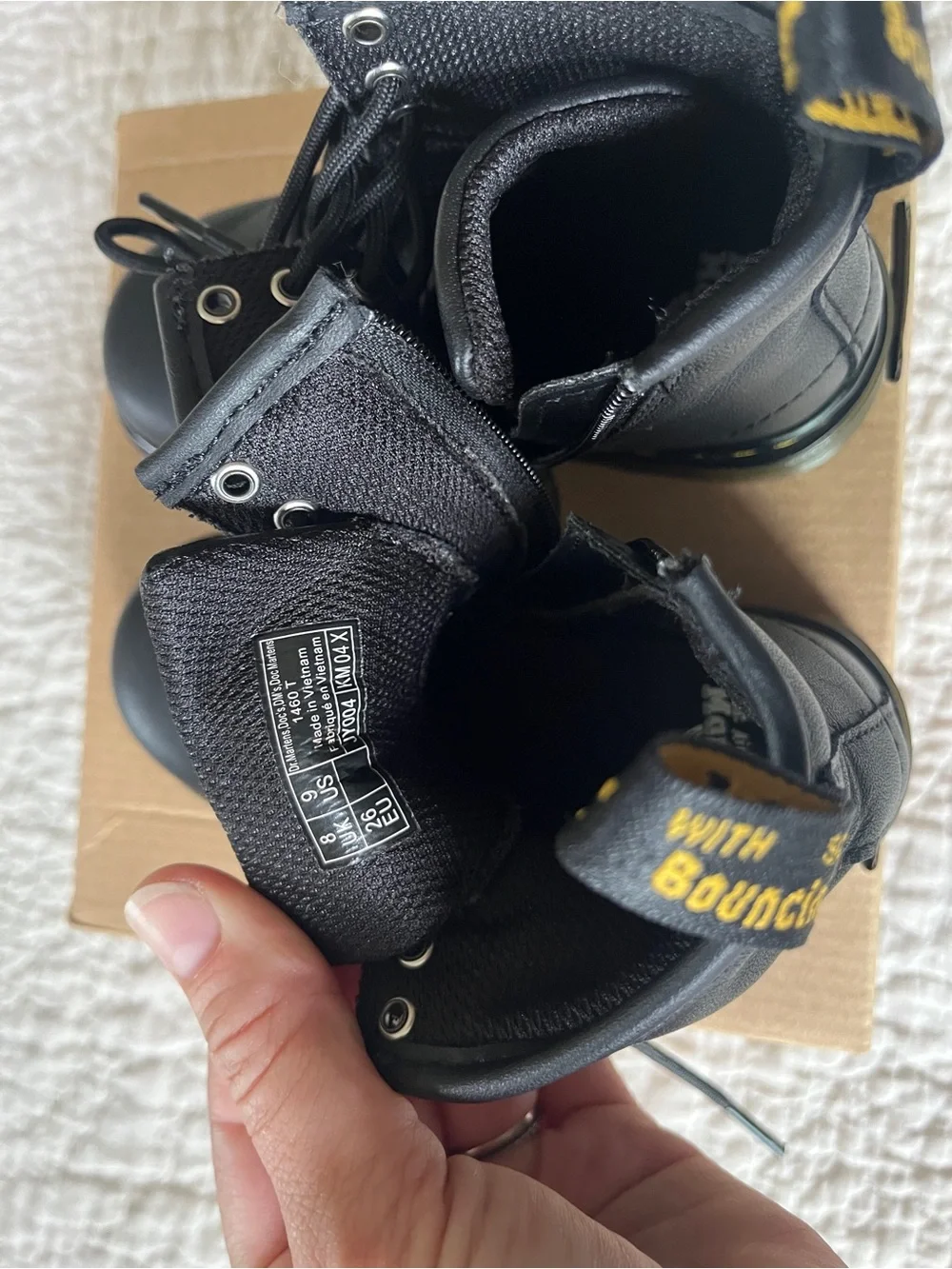 Kids Dr. Martens Black Leather Lace-Up Combat Boots with Yellow Stitching